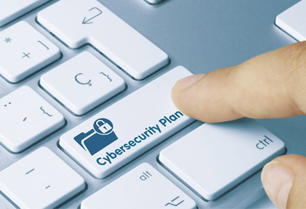 From cybersecurity to payment processing, UpPayment's team of merchant processing consultants is here to find the best solution. A finger selecting a "cybersecurity plan" key on a keyboard.