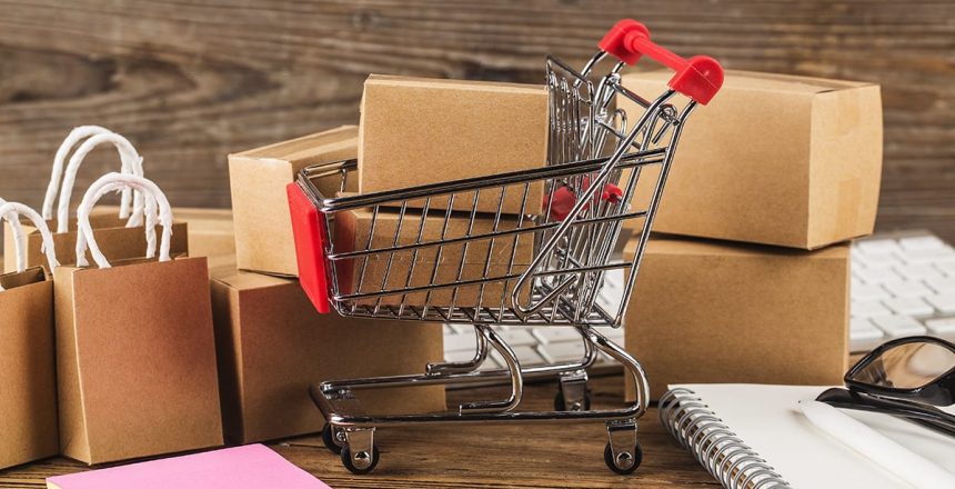 What is B2C Ecommerce? It's the driving force behind a multibillion dollar industry. B2C drives the online shopping market. A mini shopping cart holds boxes and totes.